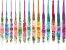 Twelve clear glass nail art tools with colorful metallic handles and embedded pressed flowers, arranged in a row on a white background.
