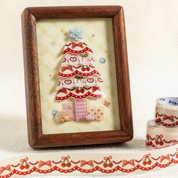 Decorative framed artwork with a tree design on a textured surface.