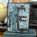 Decorative birthday card with intricate design and 'Happy Birthday' text on a textured surface.