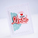 Handmade card with 'forever love' text and heart design on a white background