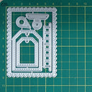 Set of metal cutting dies on a green grid background