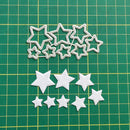 White star-shaped cutouts on a green grid background