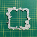 Metal frame with heart designs on a green grid background