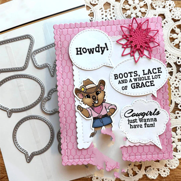 A handmade western-themed mouse card featuring a cartoon mouse in a cowboy outfit, speech bubbles reading 'Howdy!', 'BOOTS, LACE AND A WHOLE LOT OF GRACE', and 'Cowgirls just wanna have fun!', alongside pink sequin embellishments and a scalloped pink card base, shown on a white lace doily with metal die-cutting templates.