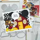 A handmade craft card featuring a cartoon mouse character in a house, shown alongside metal die-cutting and scoring tools and a package of 'Meet the Quoses' ephemeris pieces by Kats and Creations.