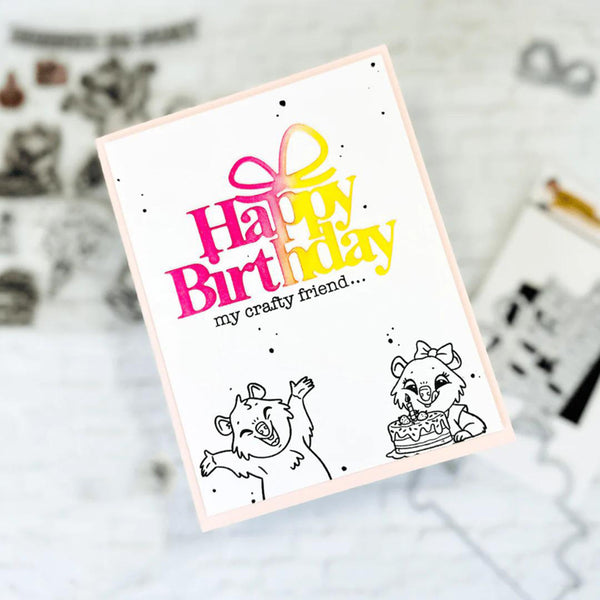 A handmade-style Happy Birthday greeting card with a pale pink border, colorful gradient text reading 'Happy Birthday my crafty friend.