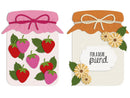 Two decorative jar-shaped cards or tags on a white background. The left one has a pink lid with a bow and several red and pink strawberries with green leaves.