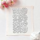 A flat sheet of beige cardstock or craft paper with multiple embossed floral and leaf-shaped cutters or stamps, photographed on a white surface with pink flowers in the top left and a small white decorative object in the bottom right.