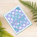 A handmade square greeting card with a lavender and light blue lattice pattern, featuring the phrase 'best day ever' in raised light blue script. The card is styled on a light wood background with green fern leaves.