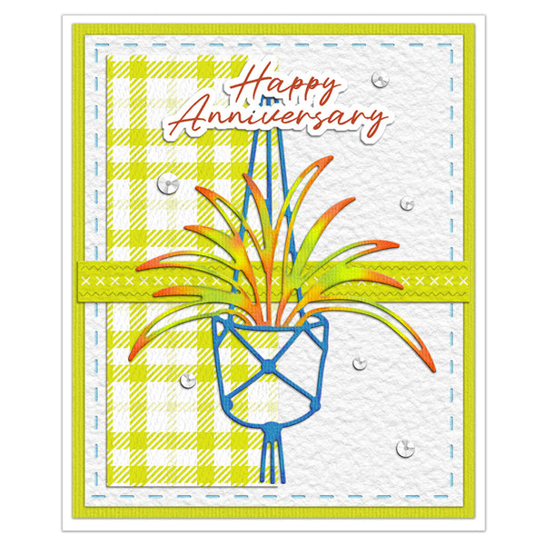 A square greeting card with a bright yellow-green border, a white textured center, a lime-and-white gingham section, blue stitched dashed lines, a blue planter outline, and orange/yellow/olive plant leaves. The card reads 'Happy Anniversary' in red script with a white outline.