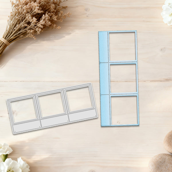Two metal photo frame templates, one silver and one light blue, displayed on a light wood background with dried flowers and white blossoms.