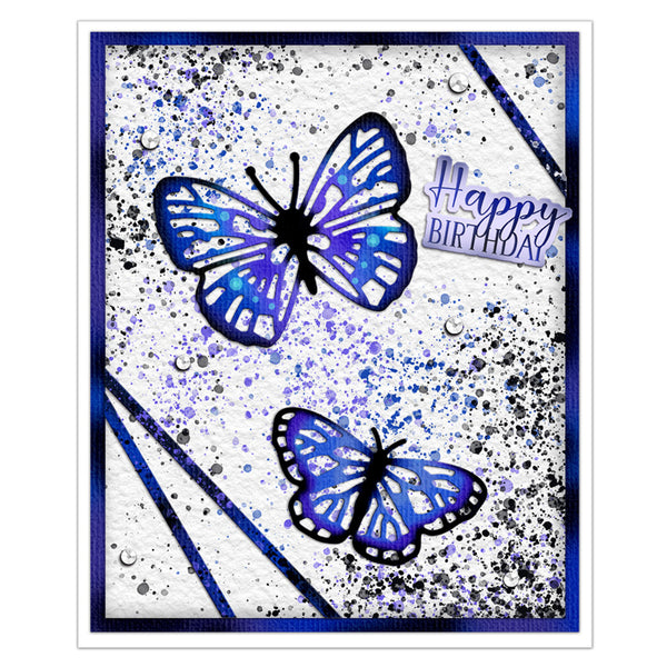 A square Happy Birthday greeting card featuring two blue and purple butterflies, black ink splatters, and diagonal blue stripes on a white textured background, framed by a blue border.