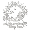 A silver metal die-cut decorative piece featuring a bird, floral motifs, and cursive script text on a plain white background.