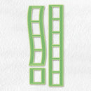 A set of three green metal embossing dies shaped like film strips, displayed on a textured white background.