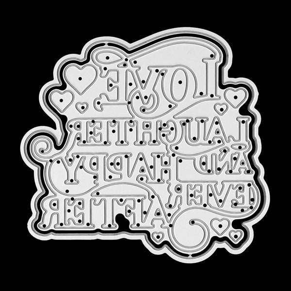 A white metal die-cut stamp or stencil featuring the word 'LOVE' in stylized gothic lettering with hearts and the phrase 'LOVE REMEMBERED' layered inside, shown on a solid black background.