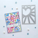 A handmade floral anniversary card with a heart motif and a silver metal die cut sheet, displayed on a white background with scattered decorative confetti.