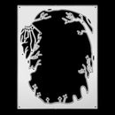 A rectangular metal die-cut craft template with a black abstract organic silhouette and white border lines, shown on a solid black background.
