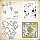 Set of floral stamps, dies, and printed card on a textured background