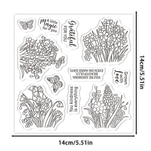 Clear stamp sheet featuring black line-art illustrations of spring flowers, butterflies, and inspirational phrases, shown with dimension markers of 14cm/5.1in on each side.