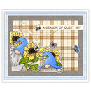 A square decorative card or art print featuring two blue-and-white garden gnomes among large yellow sunflowers, with butterflies and the text 'A SEASON OF QUIET JOY' on a plaid background. The card has a stitched-style border and is shown against a white background.