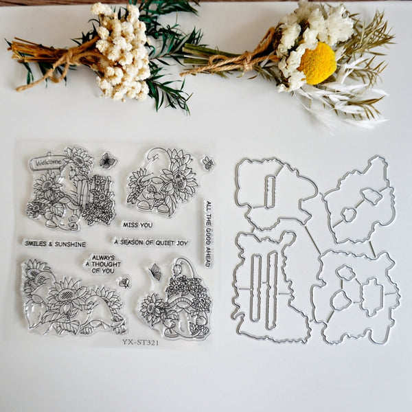 Clear acrylic stamp set with floral and text designs displayed alongside matching metal die-cut templates on a white background, styled with dried flowers at the top.