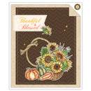 A square autumn-themed greeting card or art print with a kraft-paper border, dark brown patterned center, a rope handle, sunflowers, pumpkins, and a banner reading “Thankful & Blessed.”.