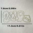 Four ghost-shaped die-cut craft cutters displayed on a textured off-white background, with black measurement lines and text indicating dimensions of 7.6cm/2.
