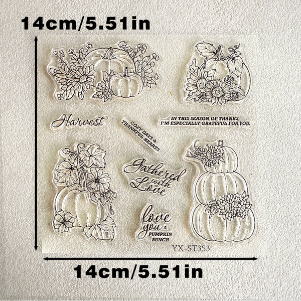 Clear acrylic stamp set featuring autumn pumpkins, flowers, and harvest-themed phrases on a textured off-white background, with black dimension lines and text indicating 14cm/5.51in measurements.