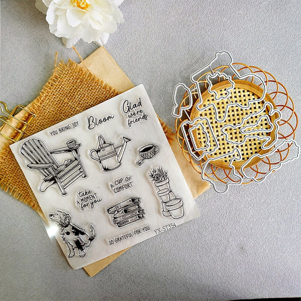 A clear stamp sheet with black line-art illustrations and text, displayed on a kraft paper sheet next to metal cookie cutters on a light gray surface.
