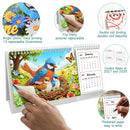 A diamond painting style desktop calendar with a bird-and-floral scene on the front cover, shown on a white background with circular callout insets demonstrating features such as colorful replaceable illustrations, freestyle flipping, double coil binding, date coverage for 2027 and 2028, and thick paper for writing. A human hand is visible peeling back the cover, so this is classified as Lifestyle rather than Product/Packaging.