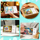 A collage showing a colorful spiral-bound desk calendar with bird illustrations and monthly calendar pages. The image includes scenes of hands holding the calendar, the calendar inside a gift box, it on a desk, and it styled on a sofa with boxes and dried flowers.