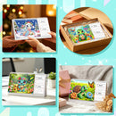 Four-panel collage showing a small standing desk calendar with colorful cartoon animal illustrations. The calendar is held by hands in a warm indoor setting, shown inside a gift box, placed on a desk, and styled on a sofa with boxes and dried flowers.