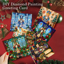 DIY diamond painting greeting cards featuring nutcracker and Christmas window scenes, arranged on a red background with holiday decorations and a hand holding one card.
