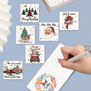 A hand is writing in a floral 'Best Wishes' journal page, surrounded by six different Christmas-themed sticker or card designs on a light blue background.