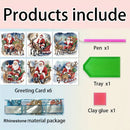 Product listing graphic showing a Christmas-themed craft kit with six Santa Claus and reindeer greeting cards, a pink pen, a green tray, clay glue, and a rhinestone material package, all labeled on a light pastel background under the heading 'Products include'.