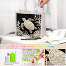 Pearl-decorated canvas tote bag with a raised sea turtle and coral design, shown with a hand holding the handle in a bright indoor setting. The image includes text overlays and small detail panels explaining the diamond art, dotting accessories, pearls, and close-up of the embellished design.