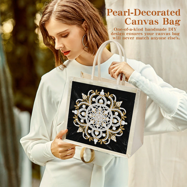 A woman in a white long-sleeve top holds a canvas tote bag with a black front panel featuring an ornate white and gold mandala design. The image includes promotional text in the upper right reading 'Pearl-Decorated Canvas Bag' with additional descriptive copy.