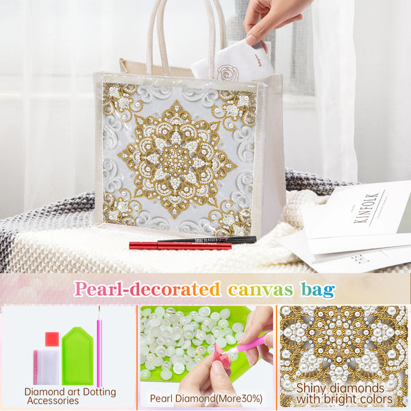 Pearl-decorated canvas bag with diamond art accessories on a table.