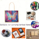 A tote bag with a colorful butterfly mandala print on a white background, surrounded by circular lifestyle and use-case photos showing it carrying various items like fruits, makeup, clothes, and stationery. Text on the image reads 'Suitable for carrying various items'.