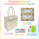 A diamond and pearl embellished canvas bag set shown on a pastel gradient background, including a clear canvas tote bag with cream handles, a decorative dragonfly canvas artwork, a small diamond bag, and diamond drilling tool accessories.