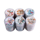 Six decorative cylindrical containers arranged in two rows on a plain white background. Each container has a colorful floral and butterfly illustration printed on the lid, with the phrase 'BRILLIANT LIKE A FLOWER' around the edge and 'have a good day' at the bottom.