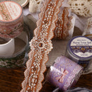 Decorative tape with floral designs on a wooden surface