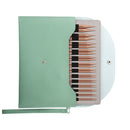 A mint green knitting needle case shown open, revealing a set of knitting needles with rose gold tips and black shafts, on a white background.