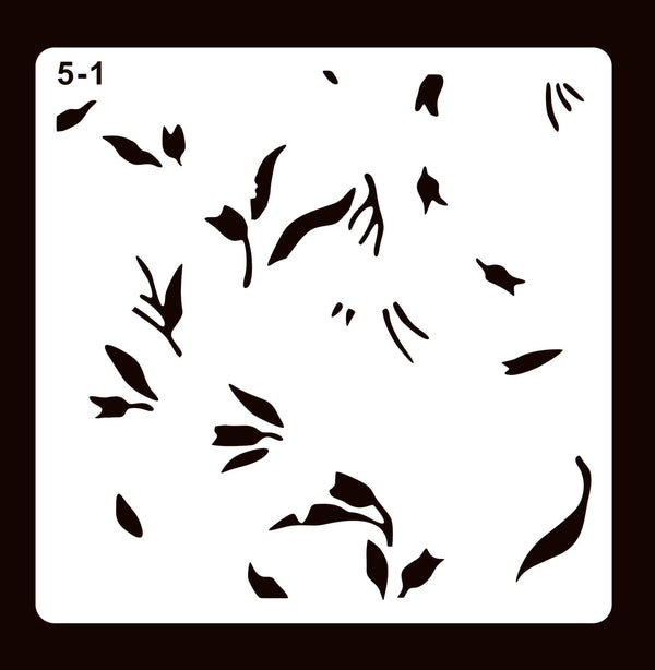 A square stencil template with the text '5-1' in the top-left corner, featuring multiple irregular black leaf-shaped cutouts on a white square panel, set against a dark brown background.