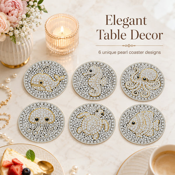 Six round pearl coasters with gold and white sea creature designs are arranged on a marble tabletop with a candle, flowers, and dessert props. Text reads 'Elegant Table Decor' and '6 unique pearl coaster designs'.