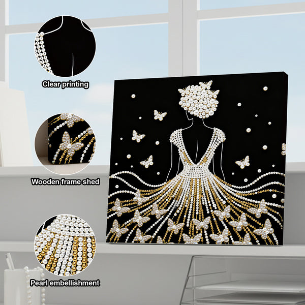 Decorative wall art with pearl embellishments and butterflies on a black background, displayed indoors.