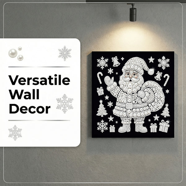 A square black wall art piece featuring a white dotted Santa Claus surrounded by holiday motifs like snowflakes, candy canes, and gifts, displayed on a gray wall under a spotlight. A white overlay on the left reads 'Versatile Wall Decor' with snowflake graphics.