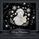 A square Christmas-themed decorative graphic featuring a white snowman made of textured stones or beads, surrounded by white snowflakes and a lantern, on a black fabric-like background with silver pearl accents. A banner at the bottom reads “Merry Christmas.