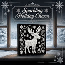 A square black canvas or plaque featuring a white reindeer and snowflake design, displayed on a windowsill with snowy outdoor scenery visible behind it. Decorative snowflakes and the words 'Sparkling Holiday Charm' appear in the scene.