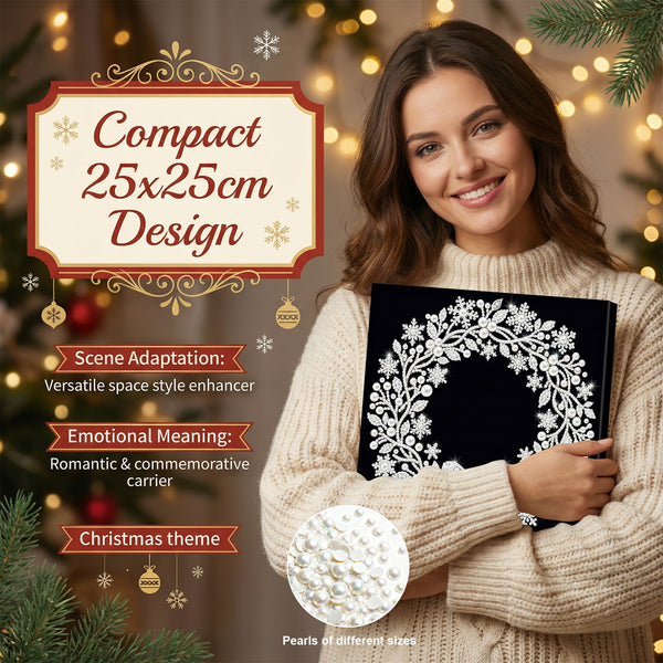 A woman in a cream knit sweater holds a black compact ornament carrier decorated with a white floral wreath design. The image includes promotional text highlighting the 25x25cm design, Christmas theme, and pearl details, set against a warm, festive holiday background with blurred lights and pine branches.